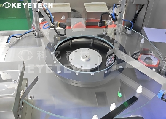 Sistema de inspección visual totalmente automático para el cierre de tapas de botellas cuentagotas